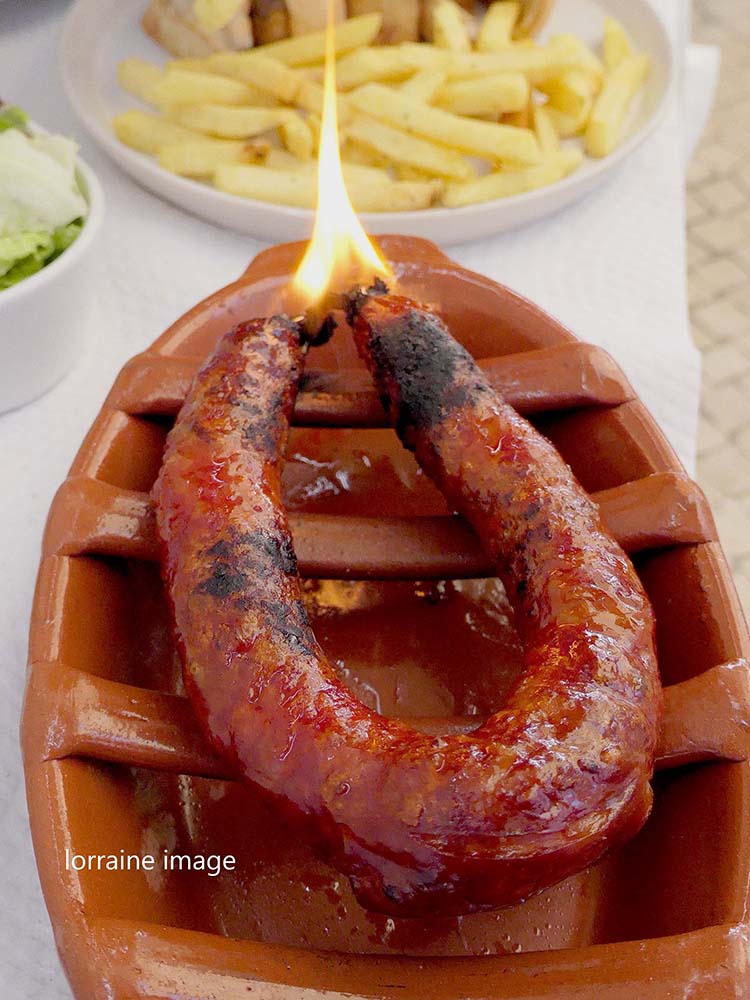chouriço assado, grilled chorizo portuguese style